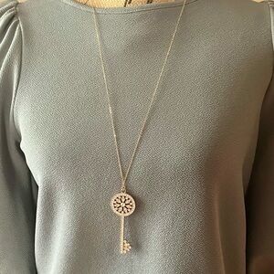 Gold crystal key pendant necklace